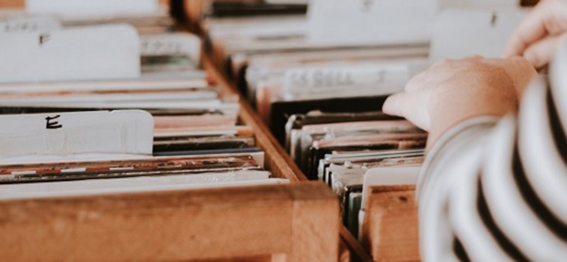 Photo of person browsing records.