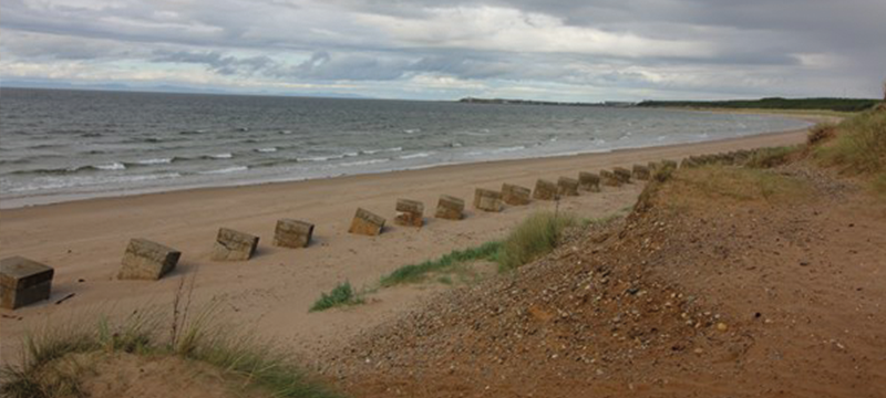 Image of beach and water on an overcast day