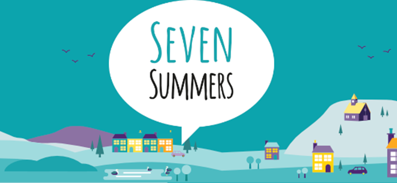 Generic town graphic with a large speech bubble. Text in the speech bubble reads "seven summers".