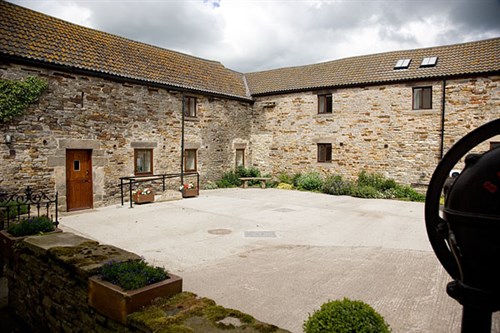 A photo of the outside of Old Byre Self Catering Cottage.