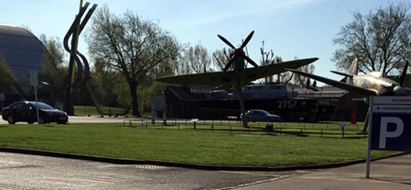 A photo of a plane at the museum. 