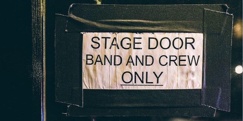 Photo of a stage door sign.