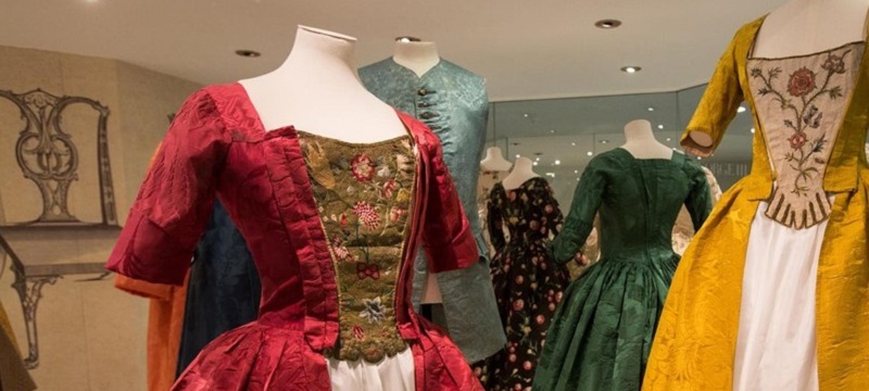 Photo of dresses at the Fashion Museum.