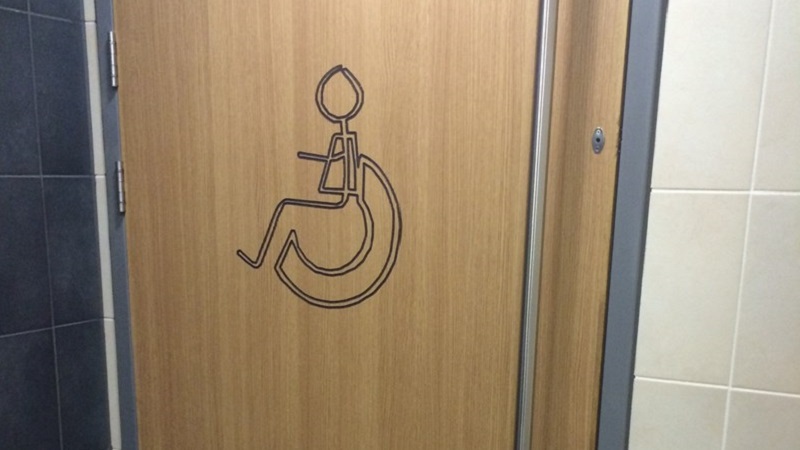 Photo of an accessible toilet door.