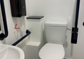Accessible toilet with full length cord