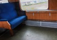 Train seat with loads of space in front for wheelchair