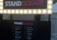 Photo of Stand in the Square sign.