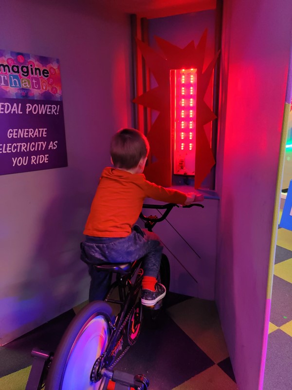 The faster you pedal the more electricity you create illustrated by the red light.
