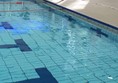 Swimming pool with hoist 
