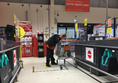 Image of the till area of the B&Q store showing staff member scanning my items.