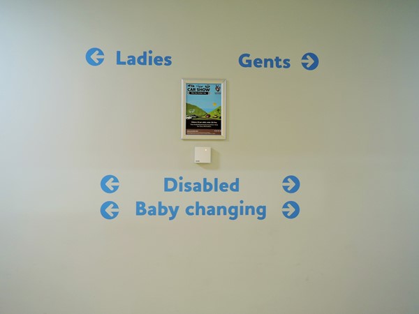 Photo of the accessible toilet signage.