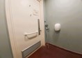Image of a gender neutral toilet door