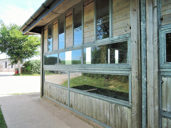 Photo of the outside of the stables.