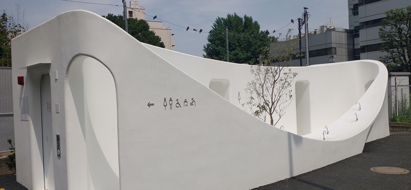 An architectural design of Nishisando - Sou Fujimoto, a white curvy building, which is one of THE TOKYO TOILETS