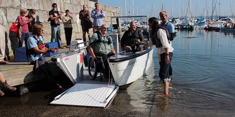 Photo of people using the wheelyboat.