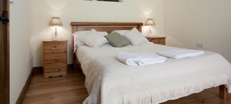 Photo of the bedroom in Iffin Farmhouse B&B.