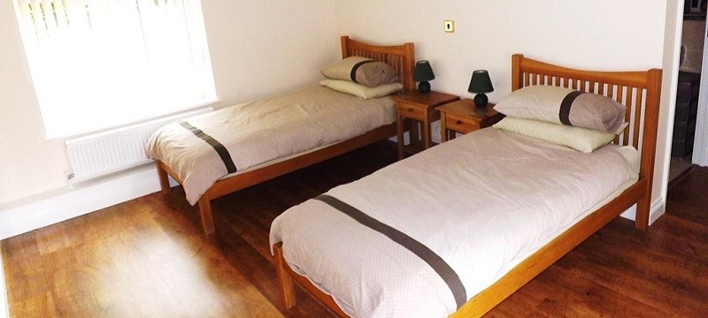 Photo of the twin bedroom in Tidmoor Cottages.