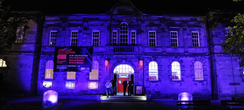 Photo of Adam Smith Theatre at night.