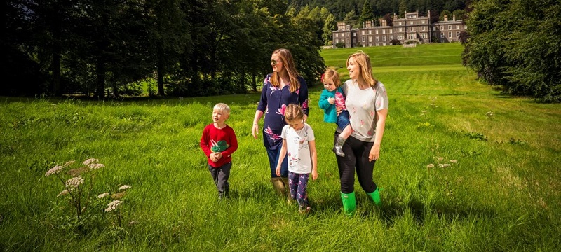 Photo of a family in the grounds of Bowhill House.