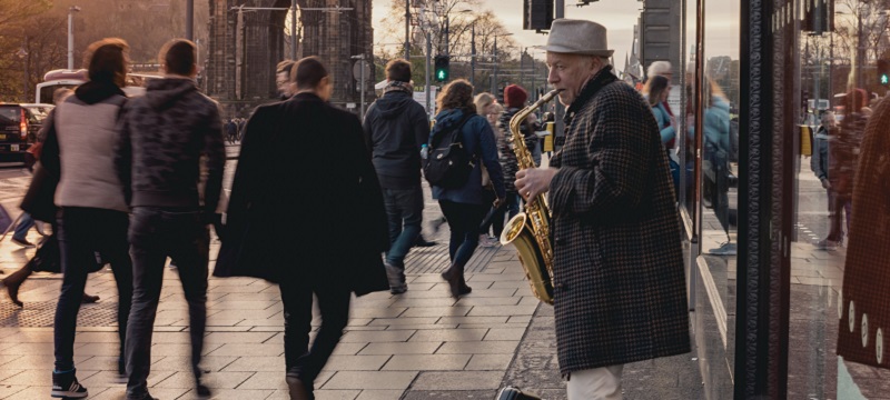 Photo of a saxophone player in Edinburgh.