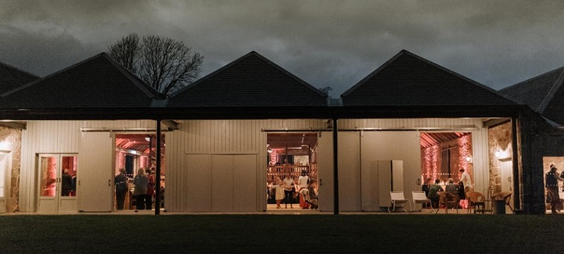 Photo of the Guardwell Farm at night.