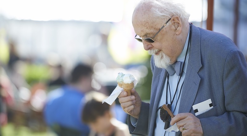 Photo of a man wearing a hearing loop.