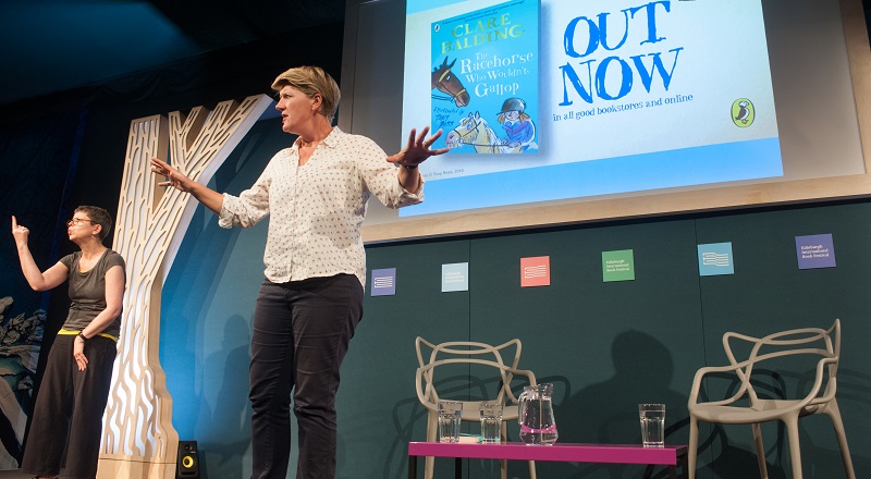 Photo of a BSL interpreter at the Book Festival.