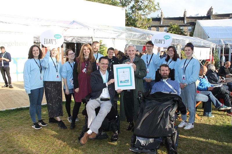 Photo of Euan and Paul with Book Festival staff.