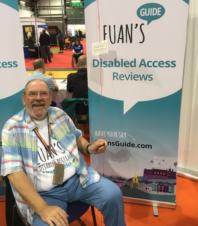 Photo of Dave volunteering with Euan's Guide at Ability Fest in Glasgow.