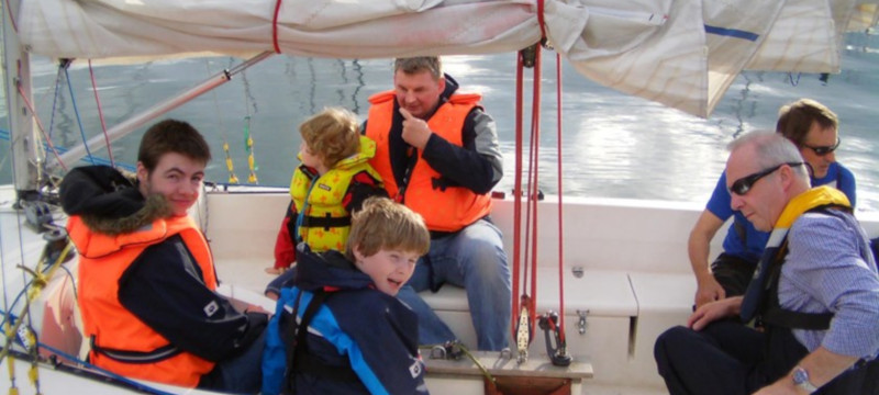 Photo of a family group at Belfast Sailability.
