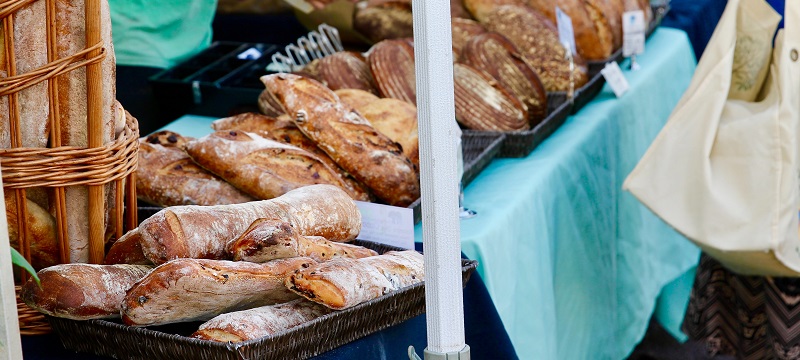 Close up of bread stall in a market.