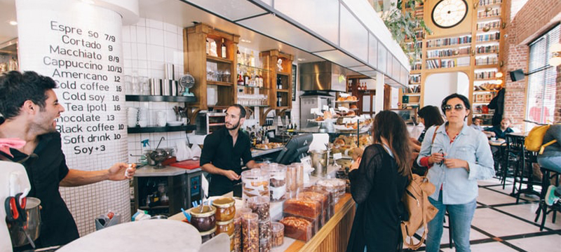 Photo of customers at a coffee shop.