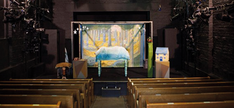 Image of an empty stage in a theatre