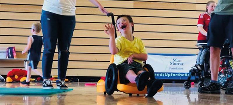 Image of young boy playing in an inclusive session