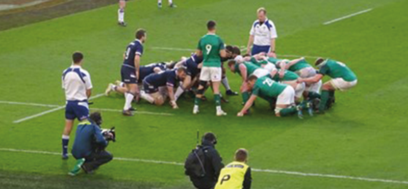 Image of Ireland and Scotland rugby teams in a scrum.