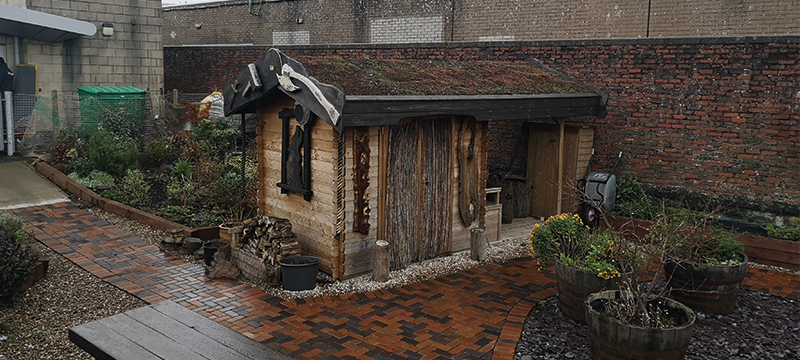 Image of small building in Largs Community Garden