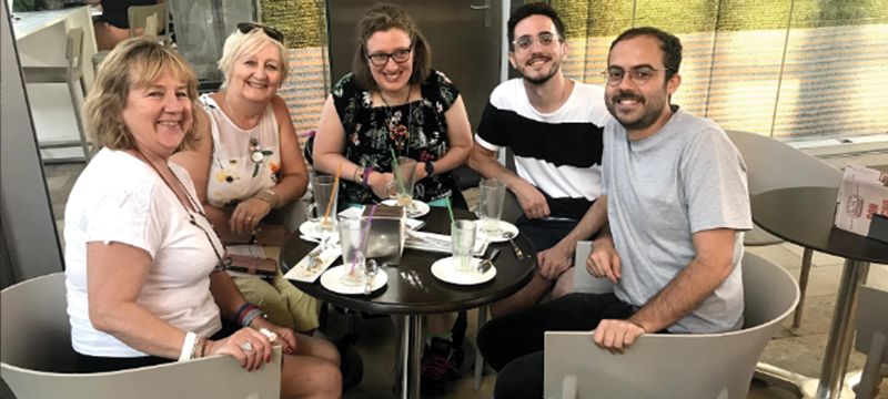 Image of: Zoe drinking Horchata with friends