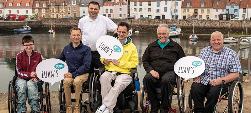 Image of Euan's Guide Ambassadors and team members by the sea.