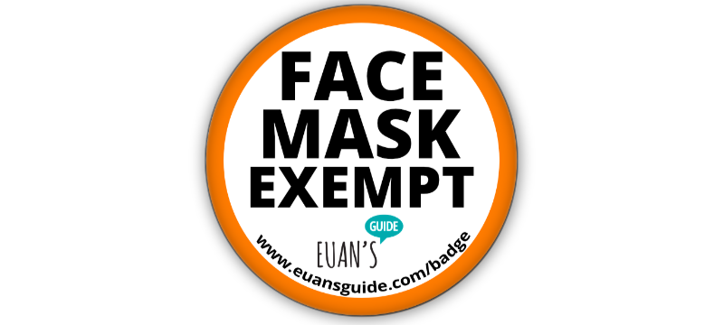 A Face Mask Exempt badge from Euan's Guide. The badge is round with an orange outline.