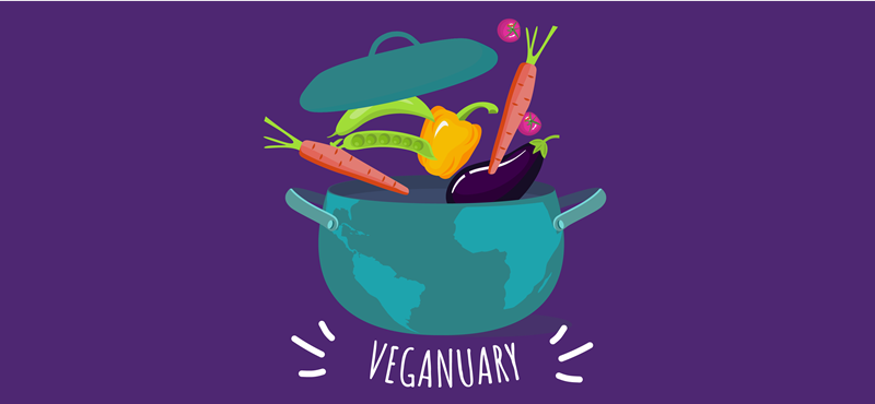 A graphic showing a pot brimming with vegetables. Text reads: "Veganuary"