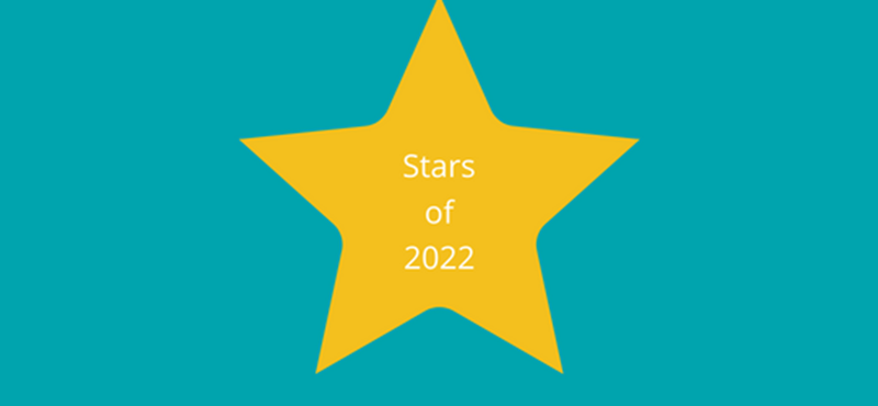 A graphic design with teal background and a gold star with white text over it Stars of 2022