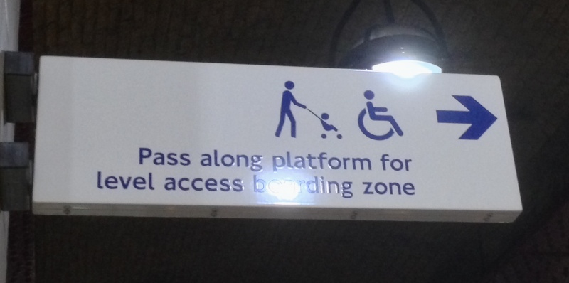 A photo of a sign on the London Underground showing where wheelchair users should go.