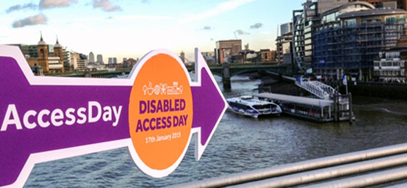 A photo of an arrow with the words 'Access Day' written on it pointing to a boat.