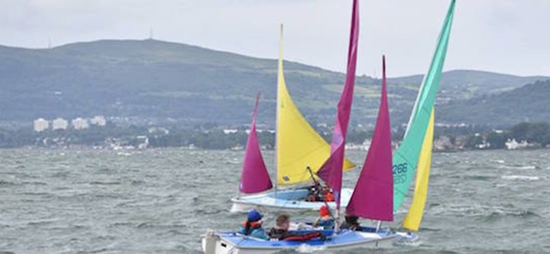Photo of racing sailboats.