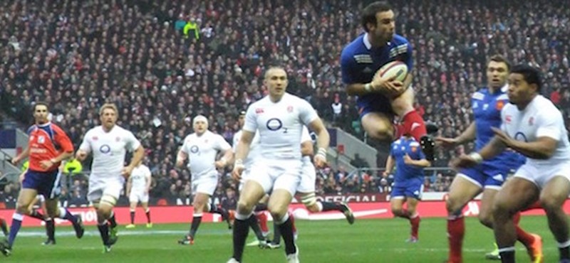 Photo of rugby players during a game.