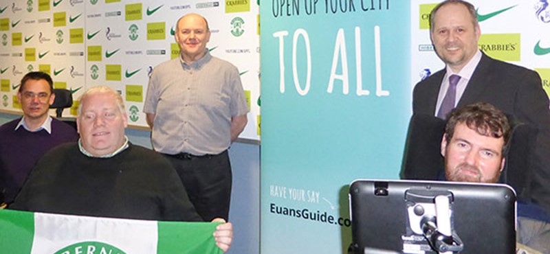 A photo of Euan at Hibernian football stadium. 