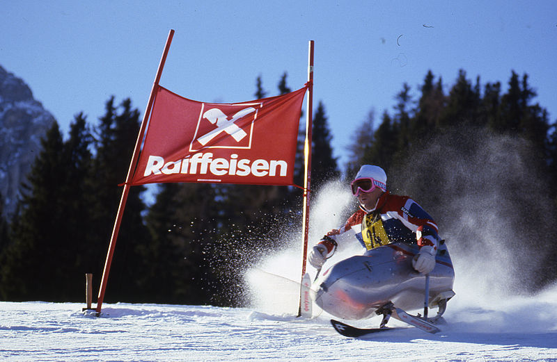 Photo of man skiing downhill.