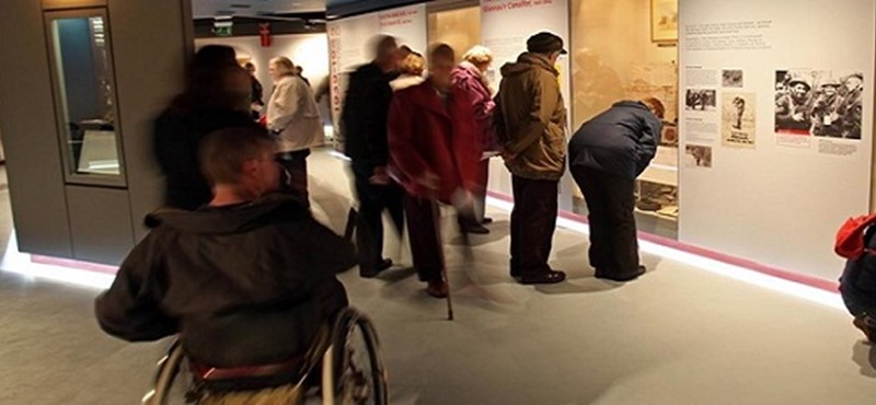 Photo of visitors to a museum.