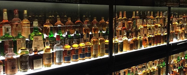 Photo of whisky bottles.