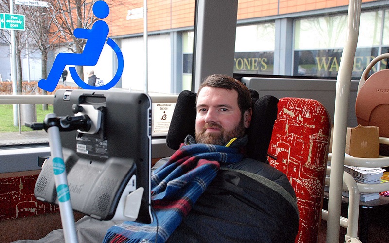 Photo of Euan on a bus.